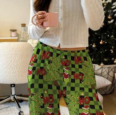 🎄🧸Celebrate the holiday season in style with our Grinch Christmas-themed striped pajama bottoms. Made from 100% brushed polyester, these pajama bottoms offer a cozy, luxurious feel that's perfect for lounging or relaxing at home. The soft, stretchy fabric drapes comfortably, while the festive stripes come to life in vivid detail and color. They make a great gift for loved ones or yourself, adding a festive touch to your Christmas season. Features: 100% brushed polyester for a soft, cozy feel L Christmas Holiday Long Pants Sleepwear, Christmas Holiday Sleepwear With Long Pants, Casual Christmas Loungewear Bottoms, Casual Christmas Holiday Pants, Casual Holiday Pants For Christmas, Casual Christmas Holiday Bottoms, Casual Pants For Winter Holiday, Christmas Loungewear Pants, Casual Long Pants For Holiday