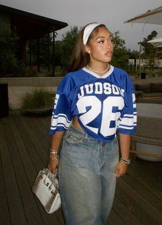 80s Jersey Outfit, Rockets Game Outfit Women, Winter Football Game Outfit Black Women, Jean And Jersey Outfit, Outfits With Jerseys Women, Game Outfits For Women Football, Jersey Outfit With Jeans, Jersey And Heels Outfits, 2000s Fashion Outfits Inspiration