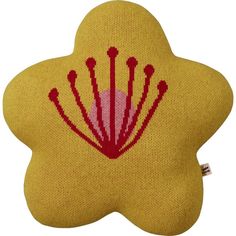 a yellow pillow with red designs on the front and back of it's head