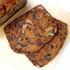 two slices of coffee cake sitting on top of a cutting board