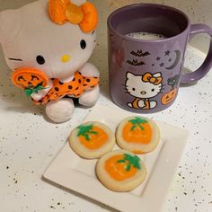 hello kitty treats and a coffee mug on a counter