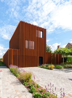 the building is made out of wooden slats