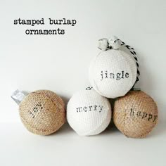 three burlap ornaments sitting on top of each other with words written on them