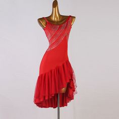 a mannequin wearing a red dress with sequins