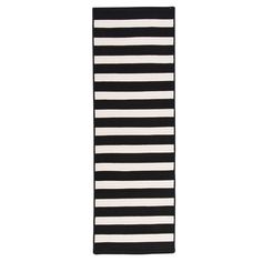 a black and white striped rug on a white background