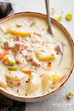 a bowl of soup with meat and vegetables