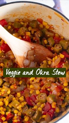 vegetables and okra stew in a pot with a wooden spoon