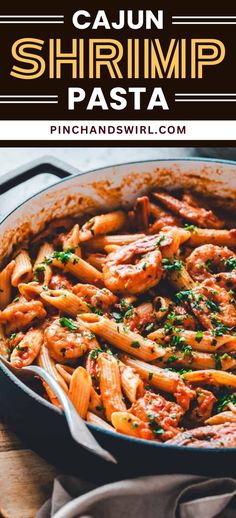 shrimp pasta in a skillet with parsley on top and the words cajun shrimp pasta