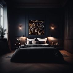 a bed in a dark room with two lamps on either side and a painting above it