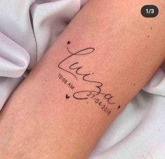 a woman's arm with a tattoo that reads, love is in the air