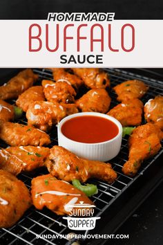 homemade buffalo sauce on a grill with chicken wings