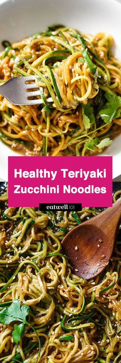 a white bowl filled with noodles and greens next to a wooden spoon on top of a table