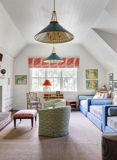 a living room filled with furniture and a fire place