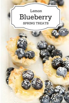 blueberries and cream filled pastry on a white plate