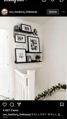 a staircase with pictures hanging on the wall above it and below them is an instagram