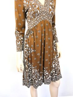 "Vintage 1970s Brown & White Dress - V neckline - zips at back - pucci style graphic print - brown & white color - jersey type material Great vintage condition. size - S 36\" bust 26\" waist full hip 38\" length 21\" sleeve US sales/shipping only. All sales are final / as-is. We do not accept returns." Vintage Printed Brown Dress, Vintage Brown Printed Dress, Brown Vintage Printed Dress, Retro Brown V-neck Dress, 1970s Fitted Brown Dress, Fitted Brown 1970s Dress, Fitted Brown 1970s Style Dresses, Vintage Pucci, Pucci Vintage