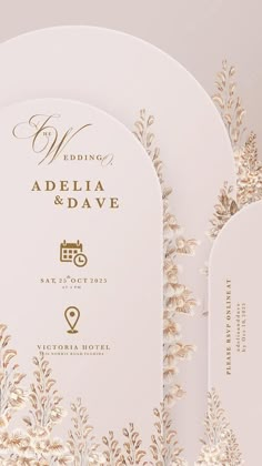 the wedding stationery is designed to look like it has been decorated with gold and white flowers