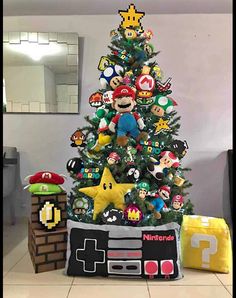 the nintendo christmas tree is decorated with all kinds of characters, including mario and luigi