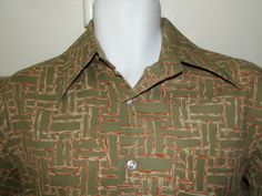 1960's or early 1970's ( Made in Hong Kong, not Korea so probably 1960's) polyester Leisure or disco shirt. From Sears Kings road store for men.1 Pocket, Well taken care of, used.   Men's current Medium :  21.5" across chest from armpit seam to seam (42" around), 29" long (bottom of back collar to bottom of shirt), 18" top back shoulder to shoulder seam.                                       Postage: USA Free 1st class.                Canada: $13.00 1st class mail                Europe & World: Fitted Green Collared Camp Shirt, Retro Fitted Green Shirt, Retro Green Collared Shirt, Fitted Retro Green Shirt, Vintage Fitted Green Shirt, Fitted Vintage Green Shirt, Vintage Green Fitted Shirt, Green Fitted Vintage Shirt, Mens Disco Outfit