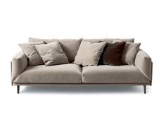 a couch with many pillows on it in front of a white background and the bottom half is