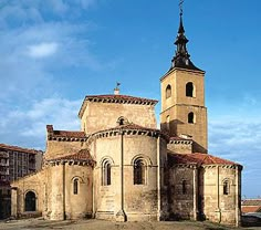 an old building with two towers and a steeple