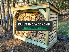 a pile of firewood in a wooden shed with a sign that says built in 1 weekend holds 1 cord