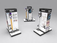 three display stands with different types of electronic devices on each one, and the same type of phone