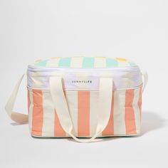 an orange, white and green striped bag with the word sunnylife written on it