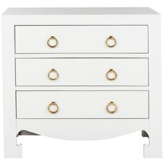 a white chest of drawers with gold handles and knobs on the bottom, against a white background