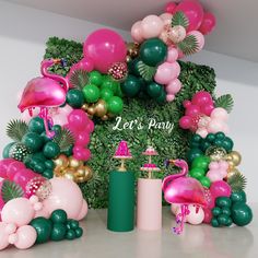 a flamingo themed birthday party with balloons and decorations