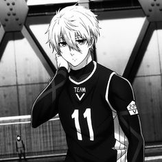 an anime character with blonde hair and black shirt holding his hand up to his face