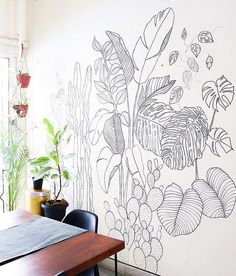 a drawing on the wall of a dining room