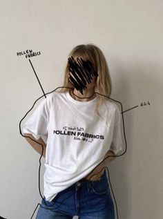 a woman standing in front of a white wall with her hands on her face and the words pollen fabrics written across it