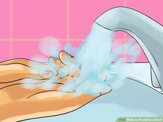 a person washing their hands under a faucet in the sink with soap on it