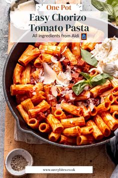 one pot easy chorizo tomato pasta recipe in a skillet on a cutting board