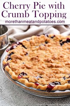 a cherry pie with crumb topping on top and the title overlay reads, cherry pie with crumb topping