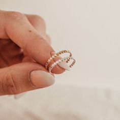 Our prettiest little glimmering stacking band, the Pippa Disc Stacking Ring is one to add to your digit set. We absolutely love wearing this in a beautiful dainty stack. These rings are handmade just for you and available in Gold Fill or Sterling Silver. As they are handmade, each one is unique. You may notice the tiny join where your ring has been soldered. Dainty Adjustable Stackable Rings For Everyday, Dainty Adjustable Stackable Toe Rings, Adjustable Dainty Stackable Rings For Everyday, Adjustable Stackable Midi Promise Rings, Dainty Stacked Rings As A Gift, Delicate Stackable Toe Rings, Delicate Adjustable Stackable Rings With Simple Design, Stackable Open Midi Rings For Promise, Tiny Delicate Open Stackable Rings