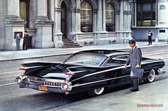 an old photo of a man standing next to a car