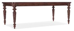 a wooden table with two legs and a drawer on one end, in the middle of it