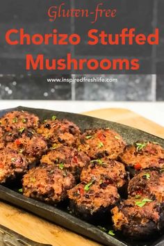 gluten - free chorizo stuffed mushrooms on a baking sheet with text overlay