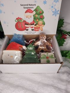 This gift set is a perfect assortment of 5 different shaped/scented soaps all boxed and tied with a bow ready for gift giving.  Children and the young at heart will love receiving this set!  Combined net weight of soaps is approximately 10 oz and is scented as follows:  Santa- Candy Cane, Gingerbread - Christmas Spice, Tree - Sleigh Ride, Snowflake - Fresh Snow and Package - Elf Sweat.  Order some fun for that special person on your list! Christmas Soap Gift, Christmas Soaps, Candy Cane Gingerbread, Christmas Gift Set, Christmas Soap, Hand Soaps, Gift Coworker, Santa Candy, Christmas Spices