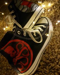 the shoes are decorated with star wars symbols