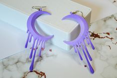 These moon earrings are super light and ready for your celestial themed outfits!  Now made with durable nylon SLS printing and painted by hand. Available in many colors with nickel free fish hook earring clasps. Let me know if there's a colour you would like but don't see. Goth Earrings, Pretty Jewelry Necklaces, Rainbow Outfit, Magical Jewelry, Purple Earrings, Stylish Bracelet, Fish Hook Earrings, Party Outfits, Themed Outfits