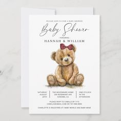 a baby shower with a teddy bear and bow tie on it's head, sitting in front of a white background