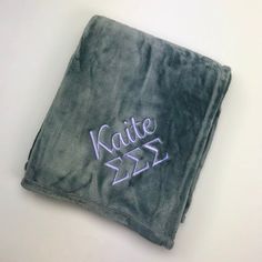 a towel with the name kate zzz embroidered on it