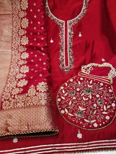 Item Overview ATHARVA Hand Embroidery Salwar Kameez/Embroidery Neck Reds/Banarsi Silk Dupatta/ Embroidered Potli/Stitch Unstitch/Tunic/Patiala/Churridar/Anarkali Dno. CH1693 Fabric: * Shirt - Chanderi Silk- Hand Embroidered Neck - Red- 2.5 Mts - Beautiful Hand Embroidery * Dupatta: Banarasi Dola Silk Dupatta- All over Embroidery - 2.5 Mts- Latkans Tassels - Reds BEAUTIFUL EMBROIDERED POTLI * Bottom Santoon Silk 2.5 Mts. Excusive Hand Embroidered Party Wear Punjabi Suit. Customization: * Fabrics Red Raw Silk Kurta For Navratri, Red Straight Kurta With Dori Work, Red Raw Silk Anarkali Set For Eid, Red Anarkali Traditional Wear For Festive Occasions, Red Chanderi Kurta With Dori Work, Red Anarkali Style Raw Silk Churidar, Red Bollywood Kurta With Dori Work, Red Raw Silk Kurta With Dori Work, Red Raw Silk Anarkali Set For Navratri