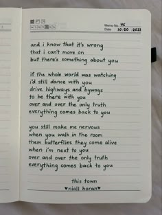 an open notebook with writing on it and a handwritten poem in the bottom right corner