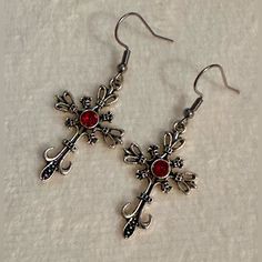 Silver Cross With Red Crystal Earrings Gothic Vampire Cross *Brand New. *Zinc Alloy Cross Charm. *Stainless Steel Earrings Hooks.(Backs Included). Style:Gothic,Punk, Retro, Coquette, Glam, Boho, Casual. Occasion: Party, Festival, Casual, School, Work. #Vampire#Cross#Earrings #Women#Unisex Vampire Earrings Aesthetic, Vampire Goth Accessories, Gothic Jewelry Aesthetic, Vampire Jewelry Aesthetic, Black And Red Jewelry, 2000s Accessories, Retro Coquette, Vampire Earrings, Vampire Jewelry