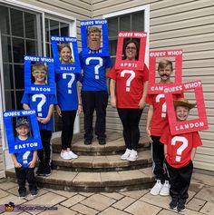 a group of people with question signs on their heads standing in front of a house