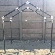 an outdoor gym with metal bars on the ground